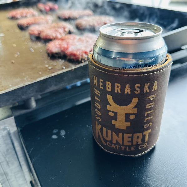 Kunert Cattle Company Koozie with smash burgers in the background